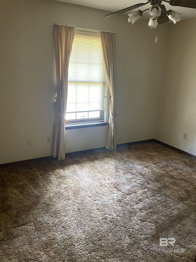 8115 Centeridge Dr, Wilmer, AL 36587 - spare room with a ceiling fan and carpet