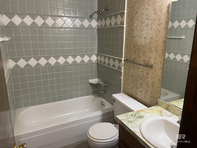 8115 Centeridge Dr, Wilmer, AL 36587 - bathroom with toilet, vanity, and shower / bathtub combination
