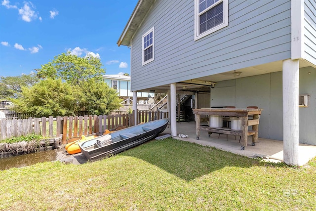 310 W 3rd Ave, Gulf Shores, AL 36542 - view of yard with stairs, a patio area, and fence