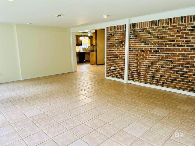 6120 Appaloosa Dr, Mobile, AL 36693 - spare room featuring light tile patterned floors, a chandelier, and baseboards