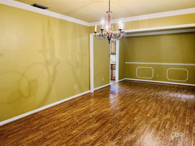 6120 Appaloosa Dr, Mobile, AL 36693 - unfurnished room with a chandelier, wood finished floors, ornamental molding, and baseboards