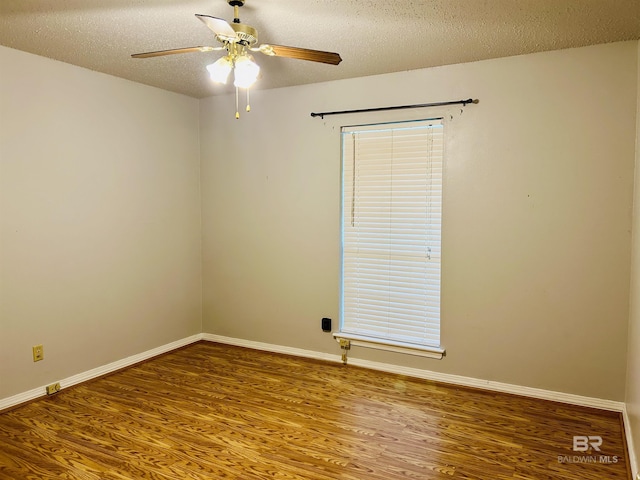 6120 Appaloosa Dr, Mobile, AL 36693 - unfurnished room with ceiling fan, wood finished floors, baseboards, and a textured ceiling