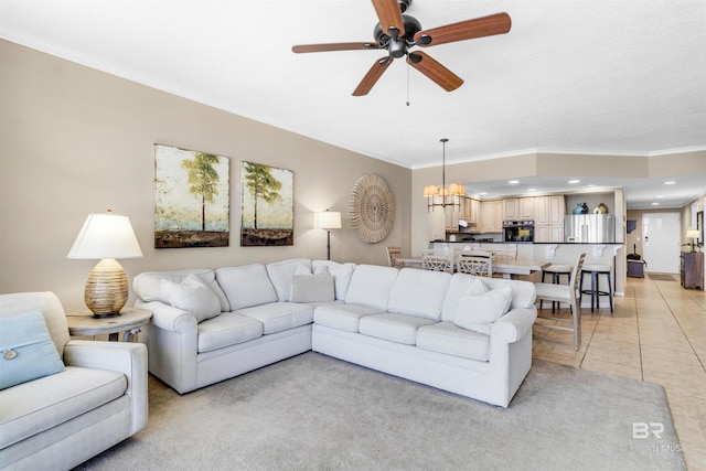 527 E Beach Blvd Unit 802, Gulf Shores, AL 36542 - living area featuring ornamental molding, ceiling fan, a chandelier, and light tile patterned flooring