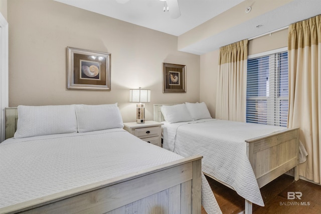 527 E Beach Blvd Unit 802, Gulf Shores, AL 36542 - bedroom with dark wood finished floors and a ceiling fan
