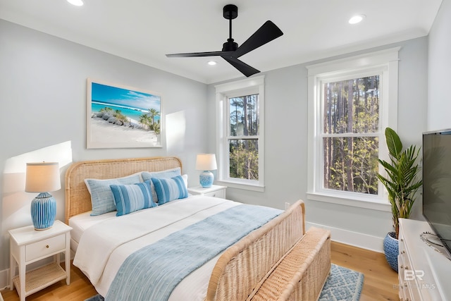 1438 Bienville Blvd Unit B, Dauphin Island, AL 36528 - bedroom featuring light wood-style floors, recessed lighting, baseboards, and ceiling fan