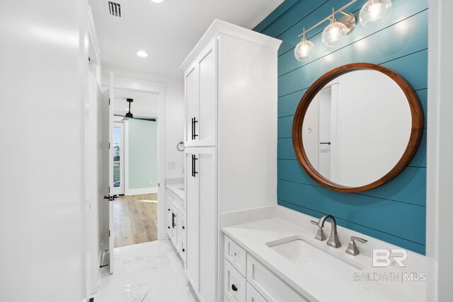1438 Bienville Blvd Unit B, Dauphin Island, AL 36528 - bathroom with vanity, recessed lighting, marble finish floors, and a ceiling fan