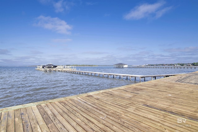 view of dock with a water view