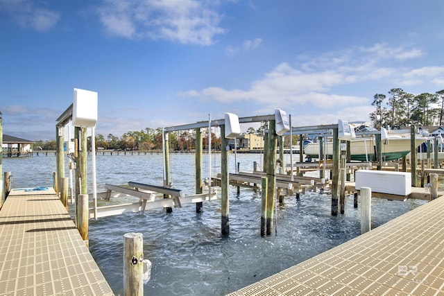 dock area with a water view