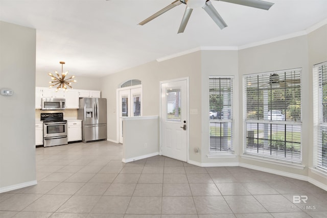 interior space with ceiling fan with notable chandelier and crown molding