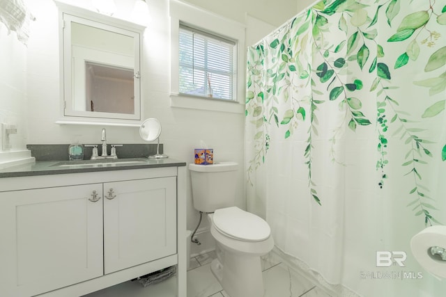 bathroom featuring tile patterned flooring, toilet, vanity, and curtained shower