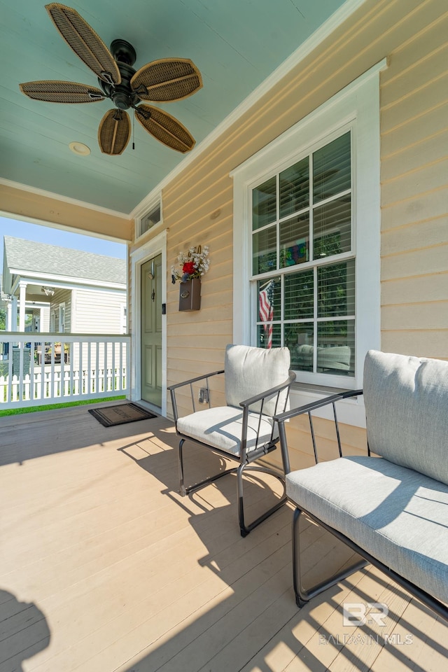 wooden terrace with ceiling fan