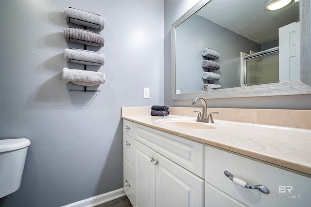 4 Yacht Club Dr, Daphne, AL 36526 - bathroom featuring vanity, toilet, and a stall shower
