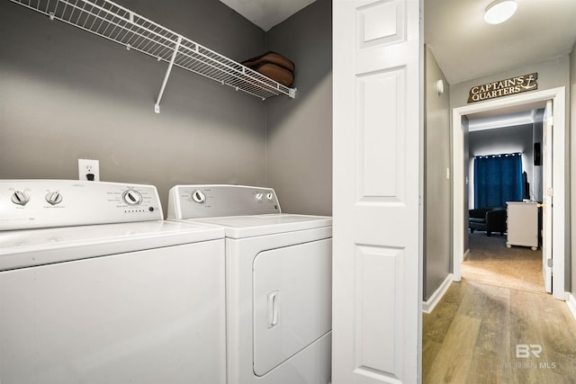 4 Yacht Club Dr, Daphne, AL 36526 - laundry room with wood finished floors, separate washer and dryer, and baseboards
