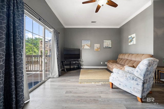 4 Yacht Club Dr, Daphne, AL 36526 - living area with wood finished floors, ceiling fan, crown molding, and baseboards