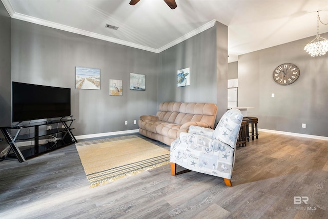 4 Yacht Club Dr, Daphne, AL 36526 - living room with wood finished floors, ceiling fan, crown molding, baseboards, and a chandelier