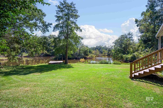 view of yard featuring a water view