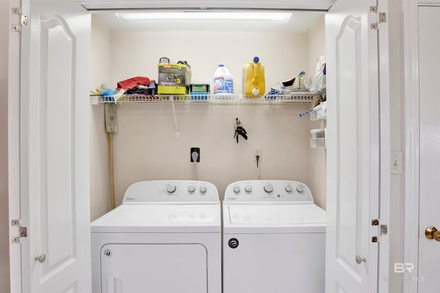 washroom with hookup for an electric dryer and washing machine and dryer