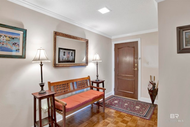 entrance foyer featuring ornamental molding, parquet floors, and a textured ceiling