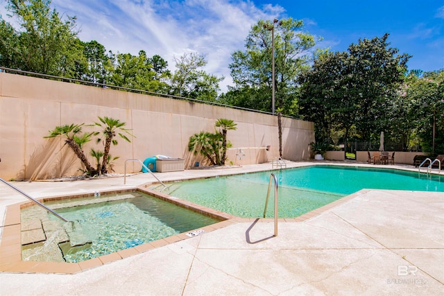 view of pool featuring a patio