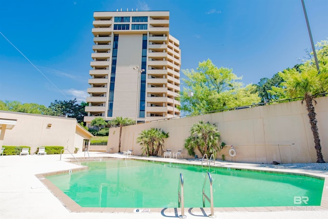 view of pool featuring a patio area