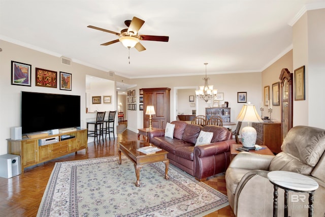 living room with ceiling fan with notable chandelier, parquet floors, and ornamental molding