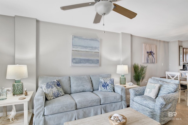 living room with a ceiling fan