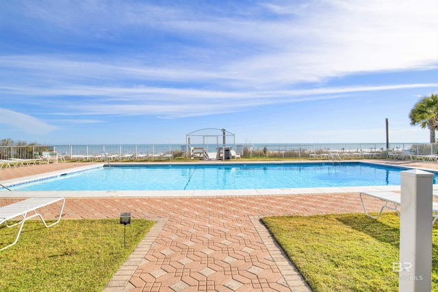 pool featuring a patio area and fence