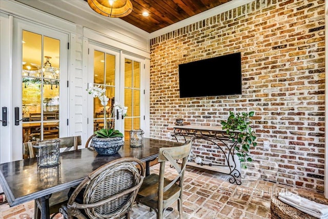 view of patio / terrace featuring outdoor dining space and french doors