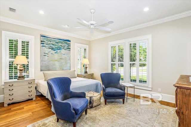 bedroom featuring ornamental molding, wood finished floors, baseboards, a ceiling fan, and recessed lighting