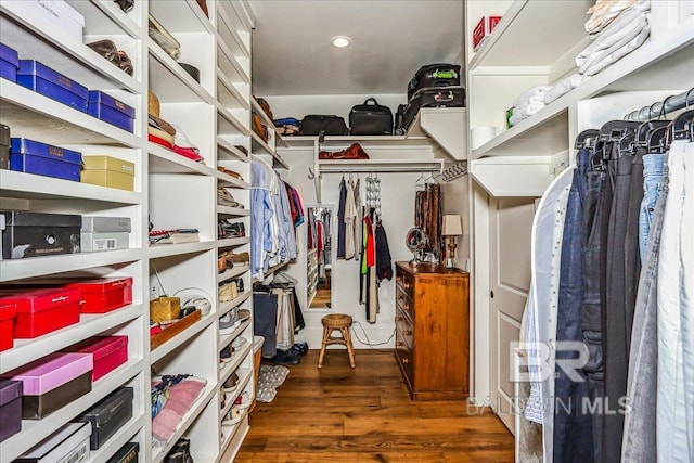 spacious closet featuring wood finished floors