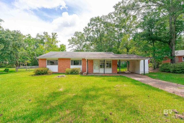 single story home featuring a carport and a front lawn