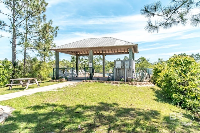 view of community featuring a yard and a gazebo