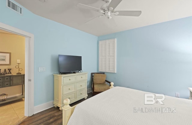 bedroom featuring hardwood / wood-style floors and ceiling fan