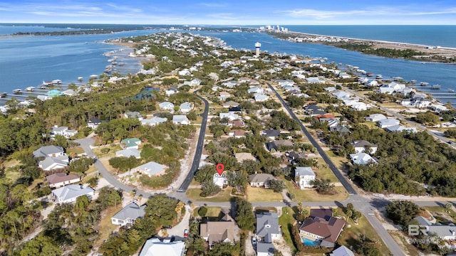 birds eye view of property with a residential view and a water view