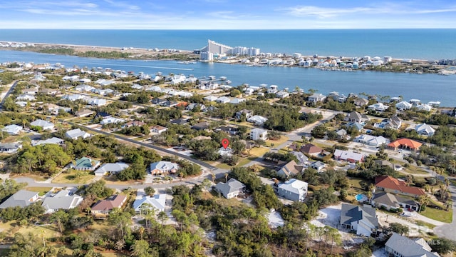 bird's eye view featuring a residential view and a water view