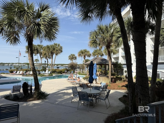 view of patio with a community pool