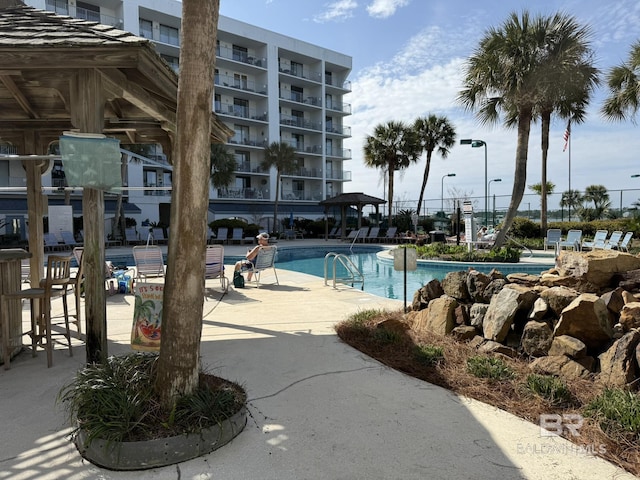 community pool with a patio