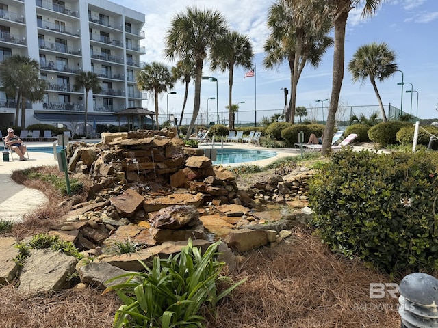 community pool with fence