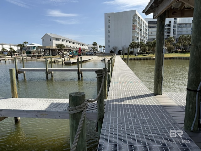 view of dock with a water view