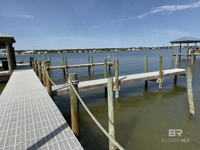 view of dock with a water view