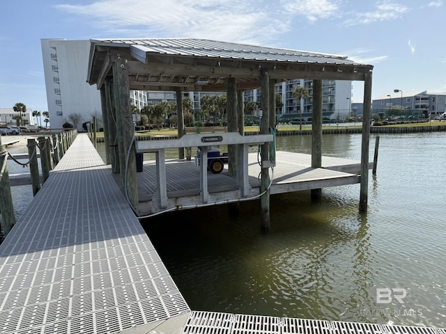 dock area featuring a water view