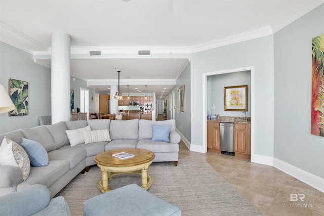 living room featuring visible vents, crown molding, baseboards, and light tile patterned flooring