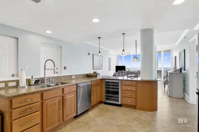 kitchen with wine cooler, a peninsula, a sink, light stone countertops, and stainless steel dishwasher