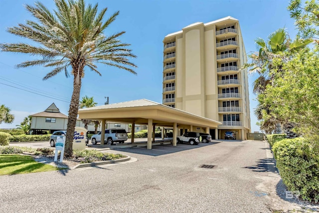 view of property with covered parking