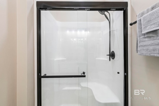 bathroom featuring a stall shower