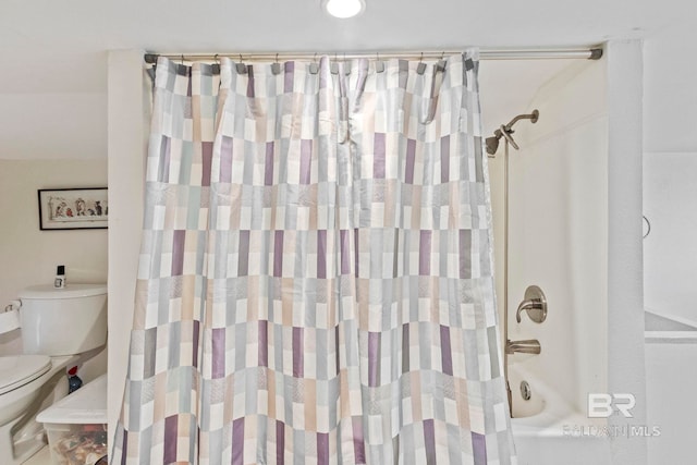 full bathroom with shower / tub combo and toilet