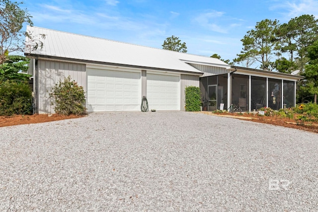exterior space featuring gravel driveway