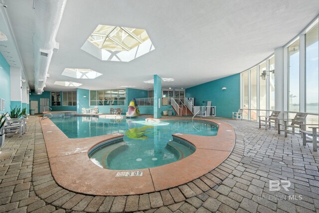 28107 Perdido Beach Blvd Unit D713, Orange Beach, AL 36561 - community pool featuring a water slide, a skylight, and a hot tub