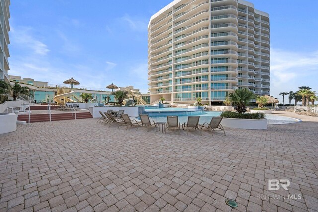 28107 Perdido Beach Blvd Unit D713, Orange Beach, AL 36561 - view of patio with a community pool