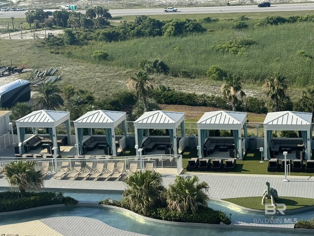 28107 Perdido Beach Blvd Unit D713, Orange Beach, AL 36561 - dock area with fence and boat lift